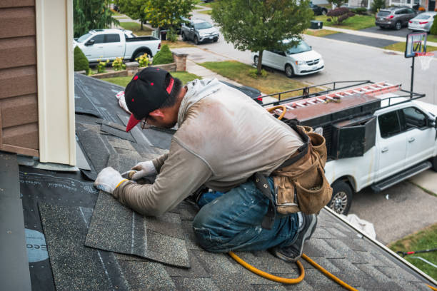 Professional Flat Roof Repair technician working in Lima, NY